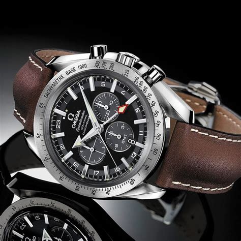 omega speedmaster broad arrow gmt.